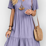 Kostkované šaty s V výstřihem