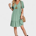 Kostkované šaty s V výstřihem